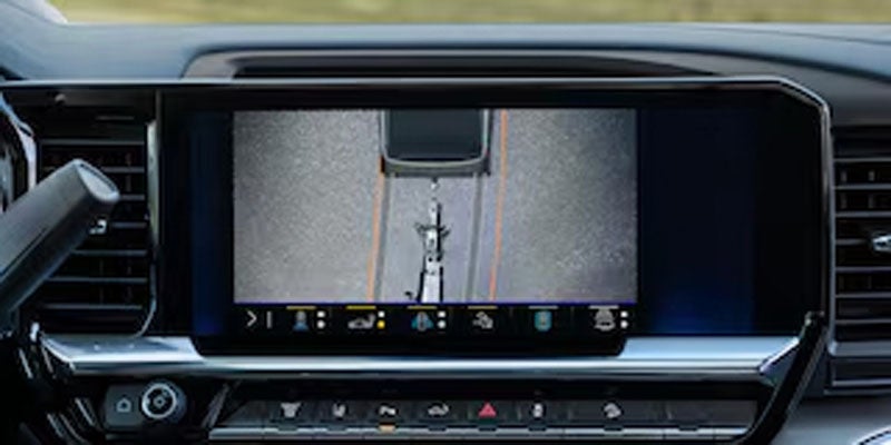 Chevrolet Silverado HD infotainment display showing a trailer camera view for enhanced towing visibility